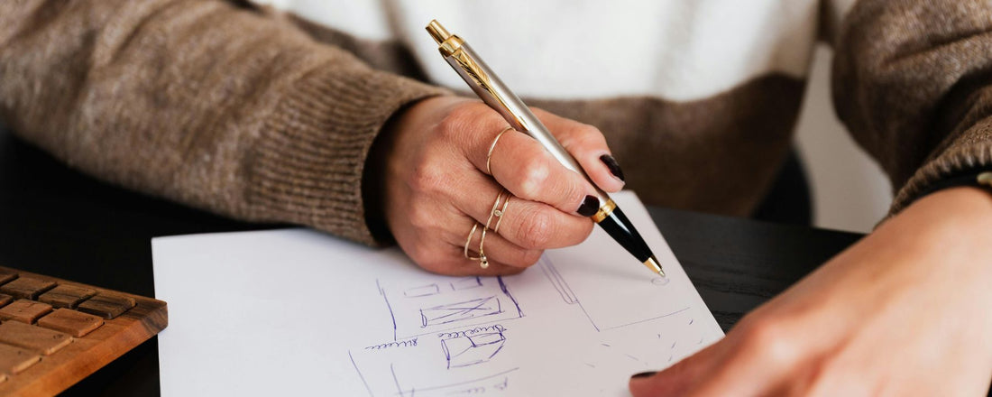 woman writing on a notebook